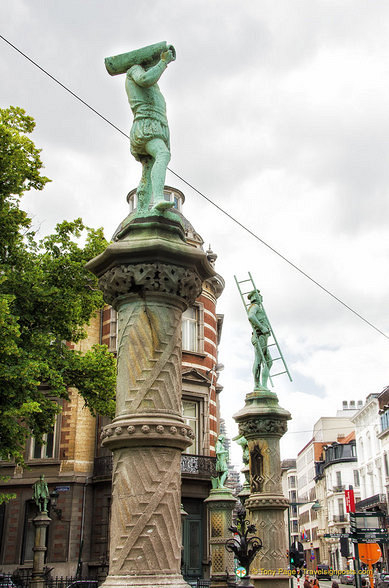 Statues of a plumber and tiler, two of 48 professions depicted