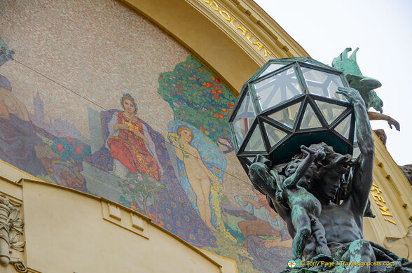 Entrance mosaic artwork and light