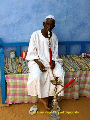 Smoking his water-pipe.

[Aswan - Egypt]