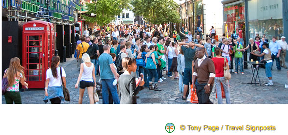 Crowds enjoying the street performers