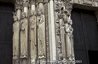 Elongated statues on the Royal Portal 