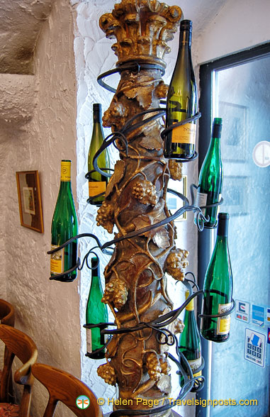 A vine of wine bottles