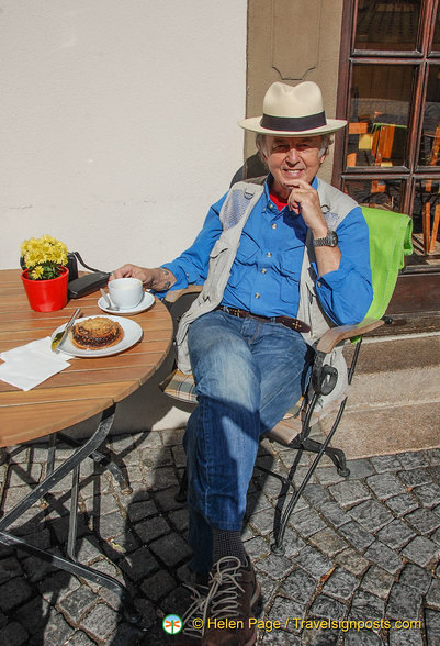 Tony enjoying coffee and cake