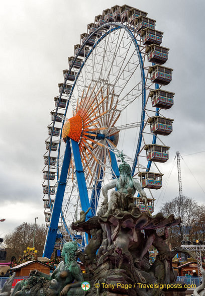 50 metre high ferris wheel with its covered gondolas