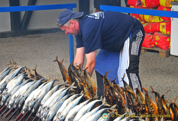 This man's in charge of turning the steckerlfish