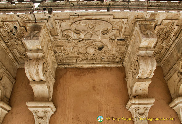 Decorative stonework under the balcony