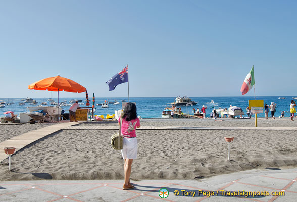 Me, taking a shot of the Australian flag on Positano beach