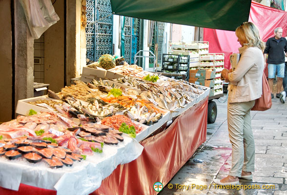 A restaurant owner checking out the seafood