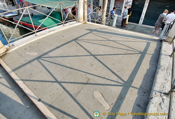 Ponte dei Pugni is where traditional fistfights used to take place. See the footprints at the four corners