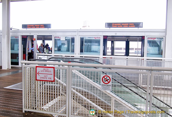 An escalator takes you to the people mover platform level