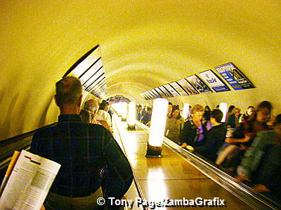 Giant escalators going down to metro station 