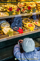 A mini visitor at the cake stall