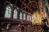 High altar and stained glass of the Basilica of the Holy Blood