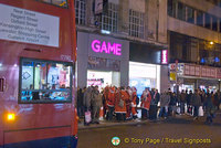 Santas queuing for work