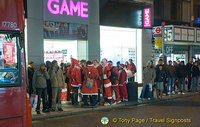 Santas getting ready for their night's work