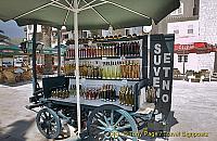 Colourful bottles of travarica - Croatian grappa