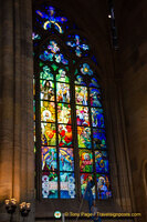 Stained glass window in 3rd chapel on northern side by Alfons Mucha