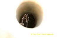 Statue of King Djoser viewed through a peephole.
[Step Pyramid of Djoser - Saqqara - Egypt]