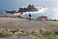 Tony checking out the dangerous cliff sign