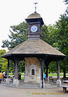 Clocktower with words 'Time Flies'