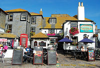 The Sloop Inn has outside tables