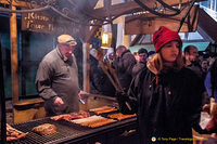 Large bratwurst and grilled meat