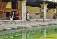 Checking the water of Bagno Vignoni