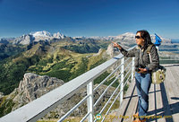 Pointing to the Dolomite peaks