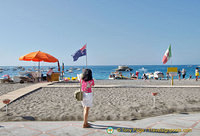 Me, taking a shot of the Australian flag on Positano beach