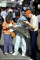 Tourists checking out their maps