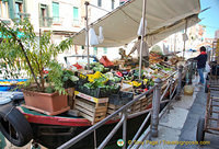 An eye-catching produce market in a barge