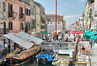 Popular produce boat on the left of the image