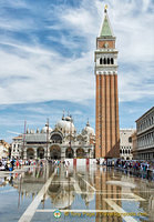 See the Basilica reflection in the water