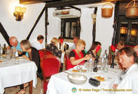 One of the dining rooms of Antico Pignolo