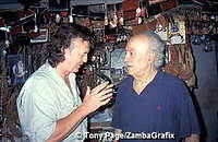 Stavros Melissinos the poet in his sandal shop, Plaka, Athens