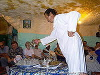 Village tour in the High Atlas with guide Mohammed pouring the tea