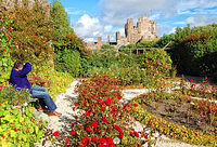 Tony photographing the Castle of Mey from the Queen Mother's bench