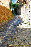 Spring water gushing down Cumalikizik's main street