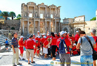 A bright tour group visiting Ephesus Library