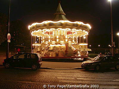 On a Carousel next to the Eiffel Tower 