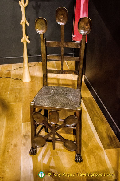 Chaise aux Cullieres - By adding large wooden spoons to this chair, Dalí surrealistically transforms a functional piece of furniture into something non-functional