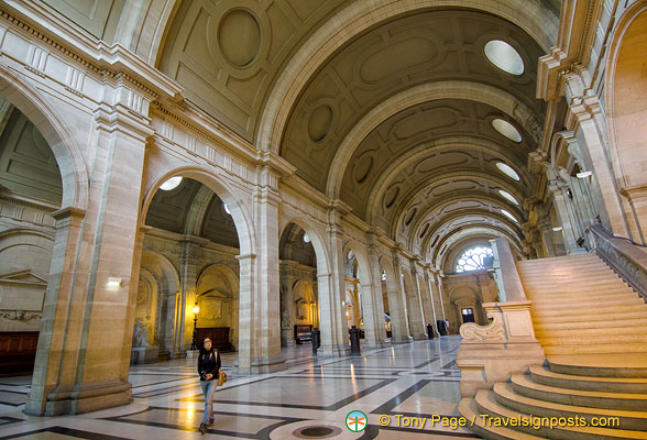 Me, admiring the grand architecture of the Palais de Justice lobby