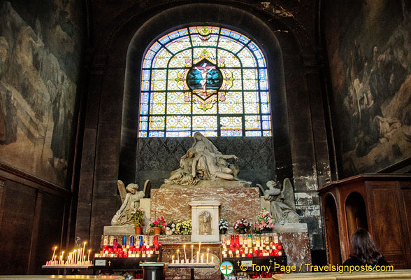 Exquisite stained glass window with Christ on the cross