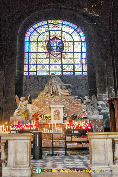 Stained glass window with Christ on the cross