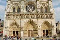 The large rose window, the gallery of kings and three large portals